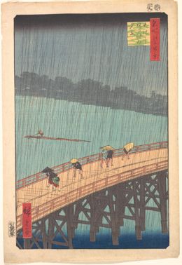 People hurrying across a wooden bridge in a heavy downpour
